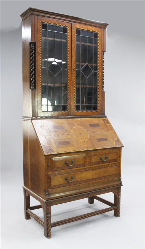 An unusual oak and specimen wood bureau bookcase, W.3ft 3in.